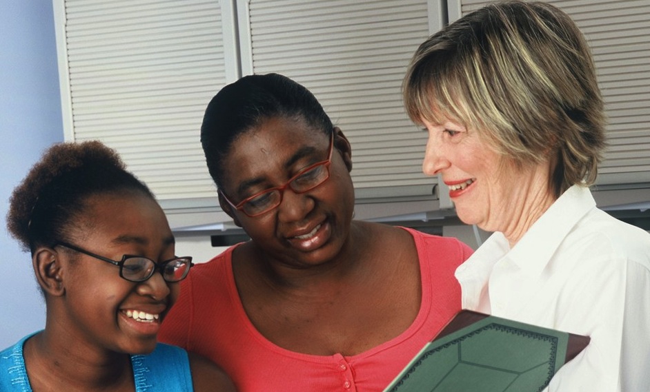 Mom and daughter with doctor